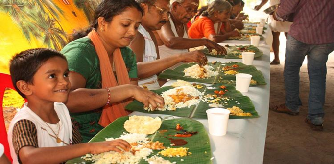 Hands in food India. A Cultural History of food. Feast why Humans share food.