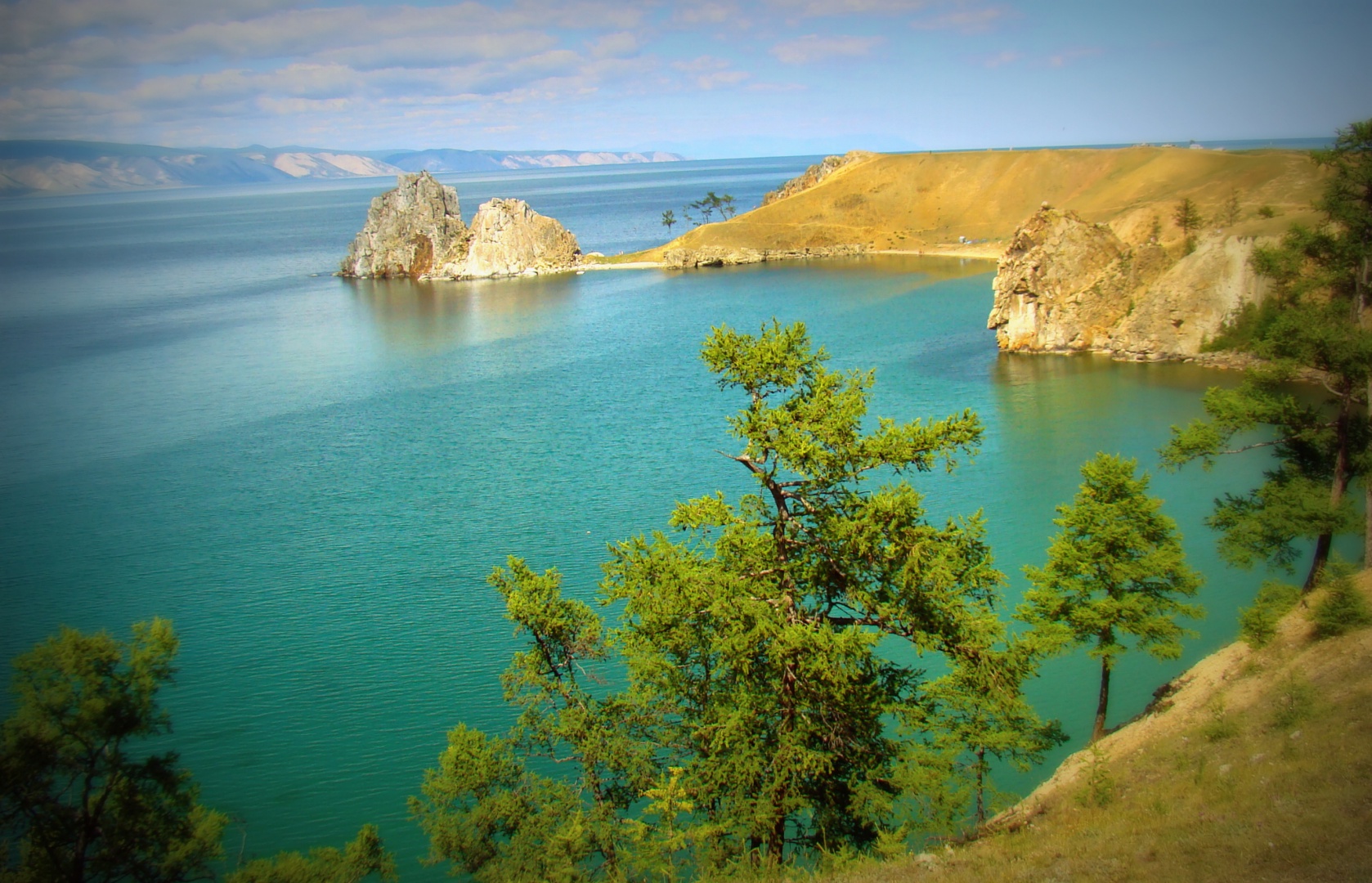 Пять морей и озеро байкал. Озеро Байкал Жемчужина. Озеро Байкал ЮНЕСКО. Байкал наследие ЮНЕСКО. Озеро Байкал Жемчужина России.