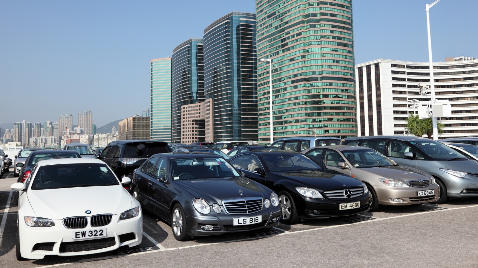 Luxury cars in parking lot in Hong Kong